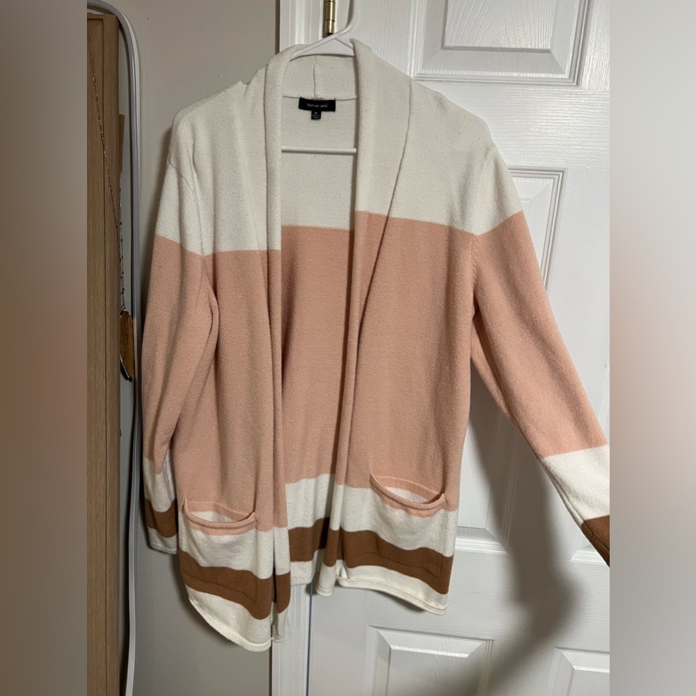Light colored sweater